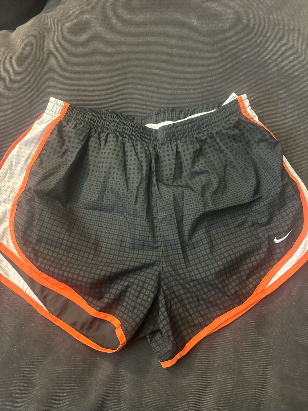 Nike Women’s Black Athletic Shorts with Orange Trim